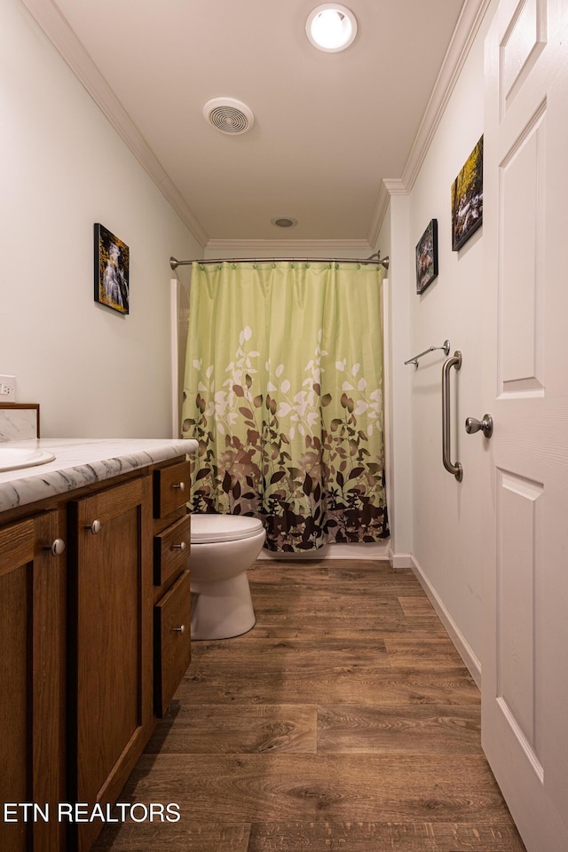 915 Yellow Breeches Rd, Cosby, TN 37722 - bathroom featuring ornamental molding, vanity, toilet, wood finished floors, and a shower with curtain