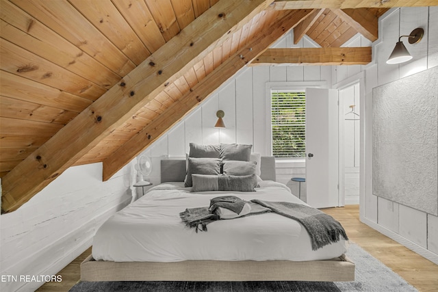 bedroom with wood finished floors and wooden ceiling