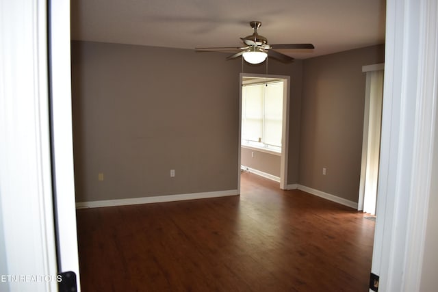 33 Wood Ln, Sparta, TN 38583 - spare room with ceiling fan, dark wood finished floors, and baseboards