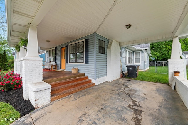 1735 NE Albert Ave, Knoxville, TN 37917 - porch featuring a carport