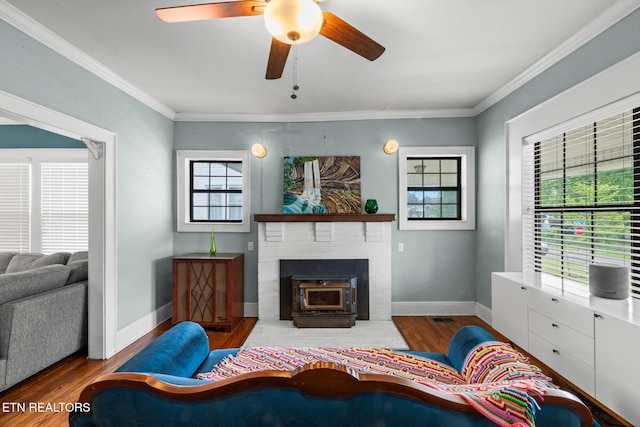 1735 NE Albert Ave, Knoxville, TN 37917 - living area with wood finished floors, ceiling fan, crown molding, and baseboards