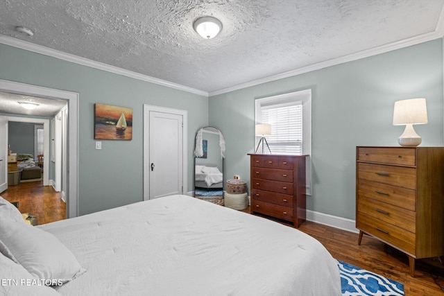 1735 NE Albert Ave, Knoxville, TN 37917 - bedroom featuring ornamental molding, wood finished floors, baseboards, and a textured ceiling