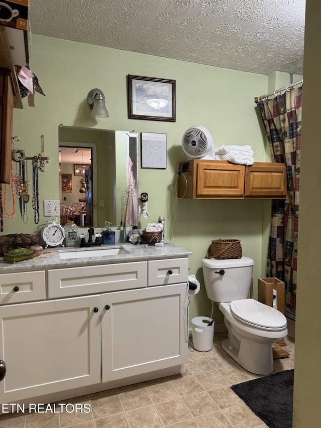 1040 Sturmhaben Way, Newport, TN 37821 - full bath featuring vanity, toilet, a textured ceiling, curtained shower, and tile patterned flooring