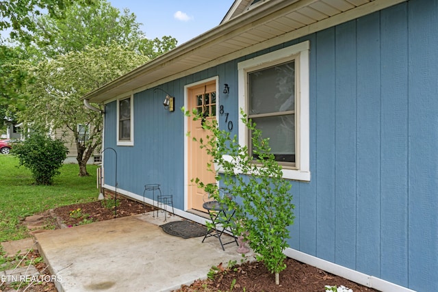 property entrance with a patio area