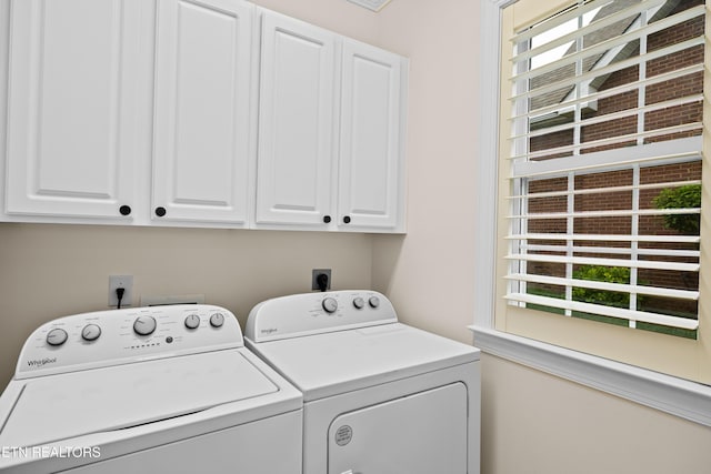 12618 Hunters Creek Ln, Knoxville, TN 37922 - washroom with washer and dryer and cabinet space