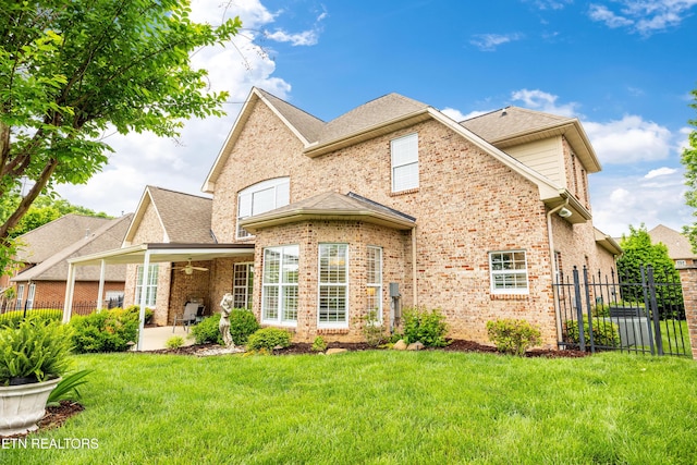 12618 Hunters Creek Ln, Knoxville, TN 37922 - rear view of house with a patio area, brick siding, and roof with shingles