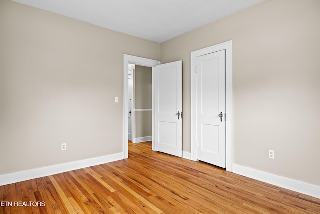1210 Chilhowee Ave, Maryville, TN 37801 - unfurnished bedroom featuring baseboards and light wood finished floors