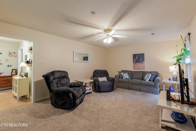 702 Shane Dr, Maryville, TN 37804 - living area with light carpet, a ceiling fan, and baseboards