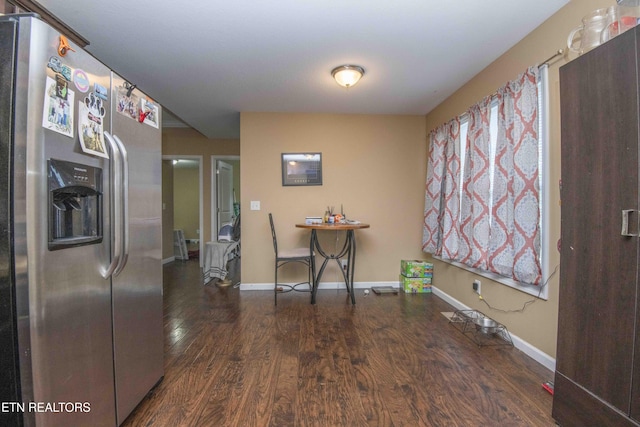 146 Prospect Rd, Maynardville, TN 37807 - kitchen featuring stainless steel refrigerator with ice dispenser, wood finished floors, and baseboards
