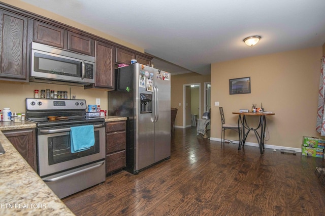 146 Prospect Rd, Maynardville, TN 37807 - kitchen with appliances with stainless steel finishes, dark wood finished floors, dark brown cabinetry, and baseboards