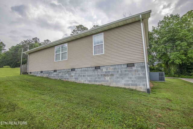 146 Prospect Rd, Maynardville, TN 37807 - view of side of property with crawl space, a yard, and central air condition unit
