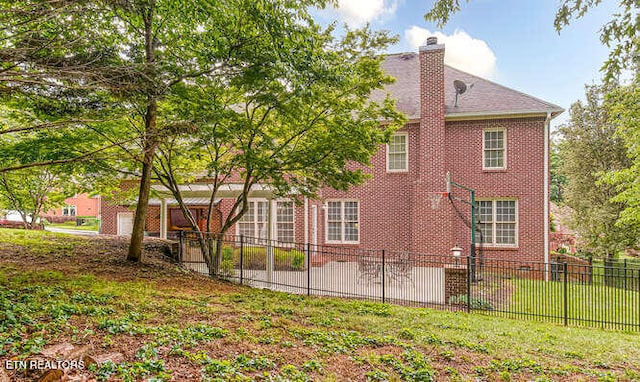 515 Oak Landing Ln Unit 4, Knoxville, TN 37934 - back of house featuring fence and a chimney