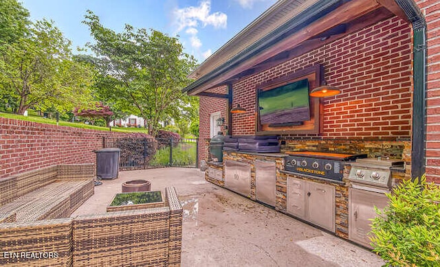 515 Oak Landing Ln Unit 4, Knoxville, TN 37934 - view of patio featuring fence, area for grilling, and an outdoor fire pit