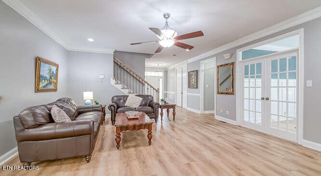 515 Oak Landing Ln Unit 4, Knoxville, TN 37934 - living area featuring ornamental molding, light wood-style flooring, stairs, baseboards, and a ceiling fan