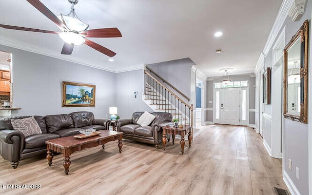 515 Oak Landing Ln Unit 4, Knoxville, TN 37934 - living room with ornamental molding, stairs, light wood finished floors, ceiling fan, and recessed lighting