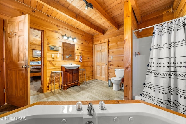 bathroom featuring wooden ceiling, toilet, beamed ceiling, a whirlpool tub, and wooden walls