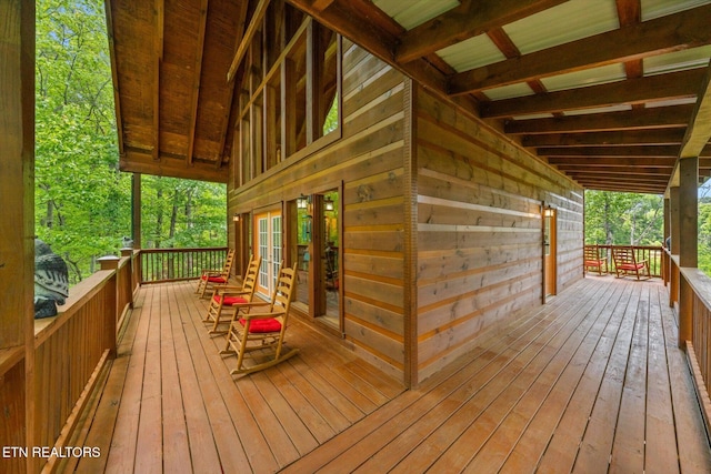 wooden terrace featuring french doors
