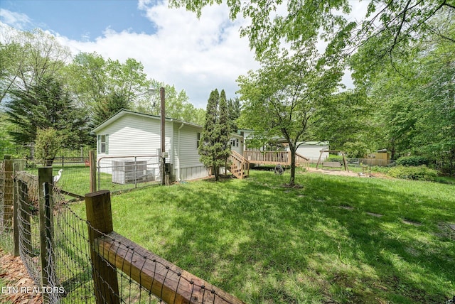 view of yard with a deck