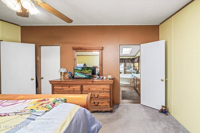carpeted bedroom with ensuite bathroom