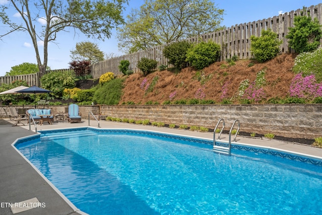 9945 Tierra Verde Dr, Knoxville, TN 37922 - view of pool featuring a fenced backyard and a patio area