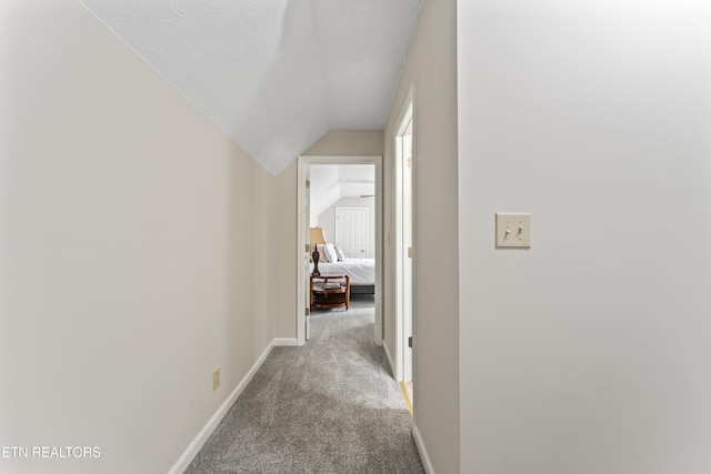 9945 Tierra Verde Dr, Knoxville, TN 37922 - hall featuring carpet, vaulted ceiling, and baseboards