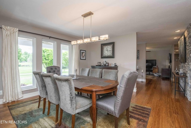 409 Celebration Rd, Knoxville, TN 37934 - dining room with wood finished floors, healthy amount of natural light, and baseboards