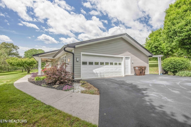 409 Celebration Rd, Knoxville, TN 37934 - view of side of home with a lawn and driveway