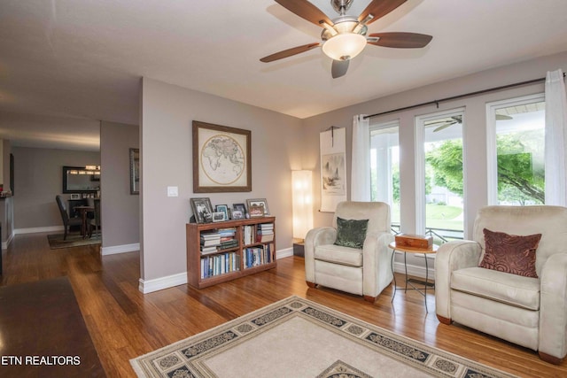 409 Celebration Rd, Knoxville, TN 37934 - living area with wood finished floors, ceiling fan, and baseboards