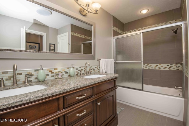 409 Celebration Rd, Knoxville, TN 37934 - full bath with backsplash, bath / shower combo with glass door, double vanity, and tile patterned floors