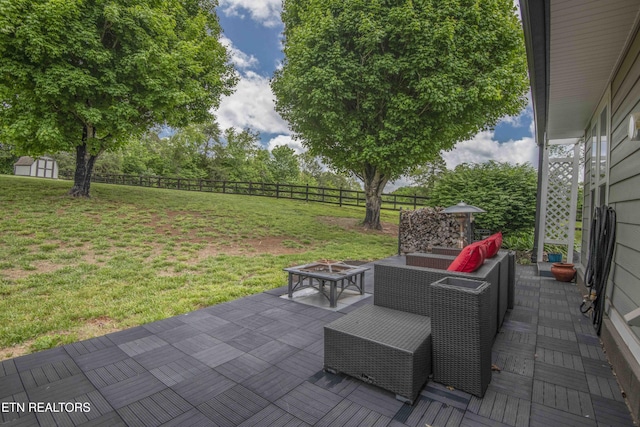 409 Celebration Rd, Knoxville, TN 37934 - view of patio / terrace with a fire pit, a shed, and an outbuilding