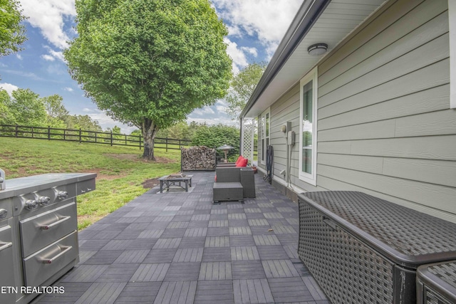409 Celebration Rd, Knoxville, TN 37934 - view of patio featuring an outdoor living space with a fire pit