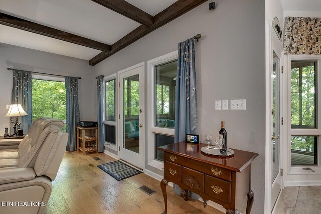 401 Shawnee Pl, Loudon, TN 37774 - living area featuring beam ceiling, light wood-style flooring, and baseboards