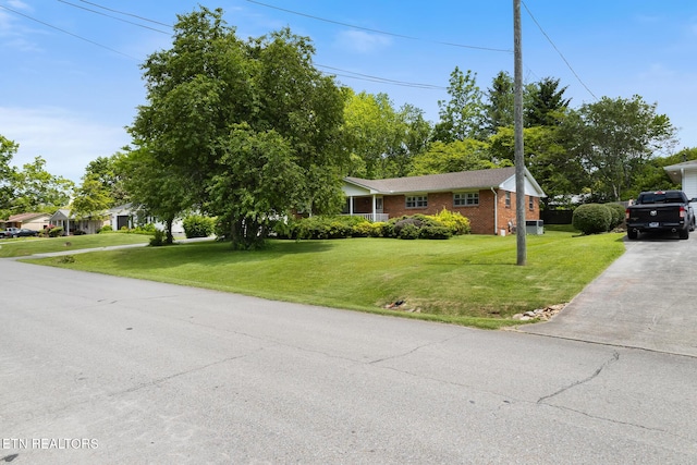 513 Long Mill Rd, Athens, TN 37303 - view of front of home with a front yard, brick siding, and driveway