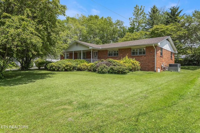 513 Long Mill Rd, Athens, TN 37303 - ranch-style home featuring brick siding, a front yard, and a porch