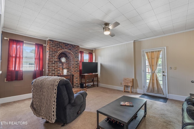 513 Long Mill Rd, Athens, TN 37303 - carpeted living room with healthy amount of natural light, crown molding, ceiling fan, and wooden walls