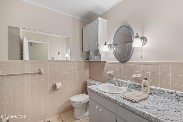 513 Long Mill Rd, Athens, TN 37303 - bathroom featuring tile patterned flooring, ornamental molding, vanity, tile walls, and a wainscoted wall
