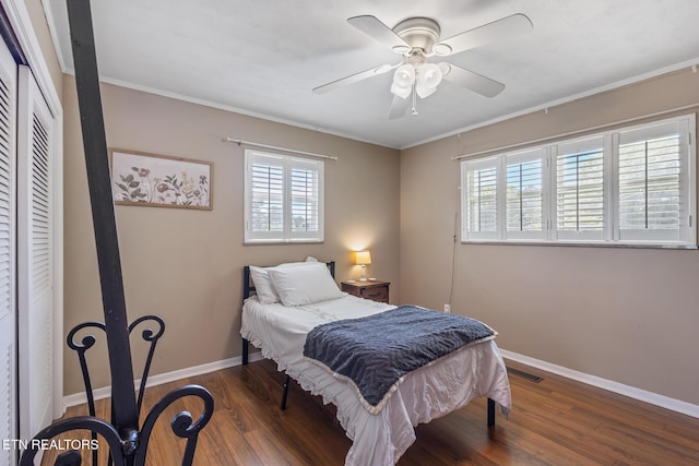 513 Long Mill Rd, Athens, TN 37303 - bedroom featuring wood finished floors, multiple windows, a closet, and crown molding