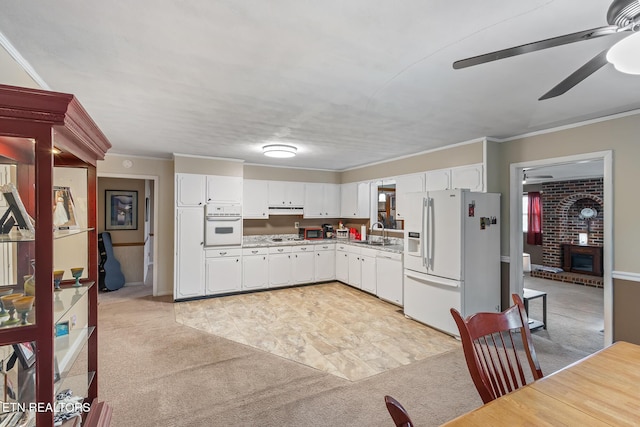 513 Long Mill Rd, Athens, TN 37303 - kitchen with white appliances, a ceiling fan, light carpet, light countertops, and white cabinets