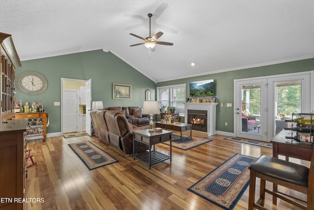 3083 Waters Edge Dr, Morristown, TN 37814 - living room featuring ceiling fan, wood finished floors, baseboards, lofted ceiling, and ornamental molding