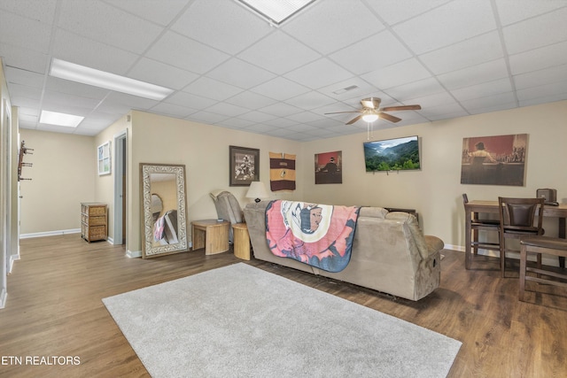 3083 Waters Edge Dr, Morristown, TN 37814 - living room with a drop ceiling, a ceiling fan, baseboards, and wood finished floors