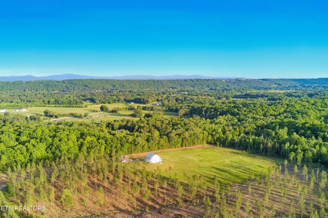 819 NW Morgan Rd, Charleston, TN 37310 - drone / aerial view of a heavily wooded area and mountains