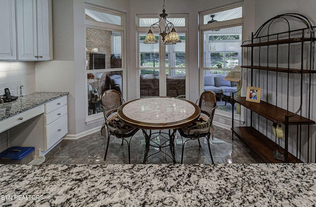 dining space with baseboards