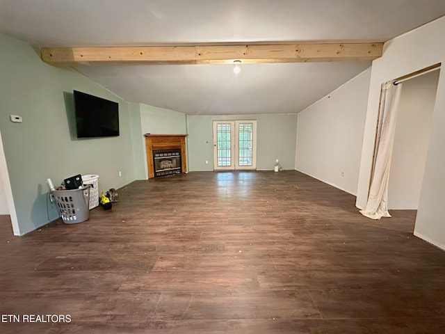 unfurnished living room with wood finished floors and a fireplace