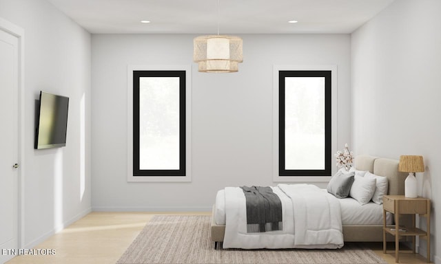 7814 S Northshore Dr, Knoxville, TN 37919 - bedroom featuring wood finished floors, recessed lighting, and baseboards