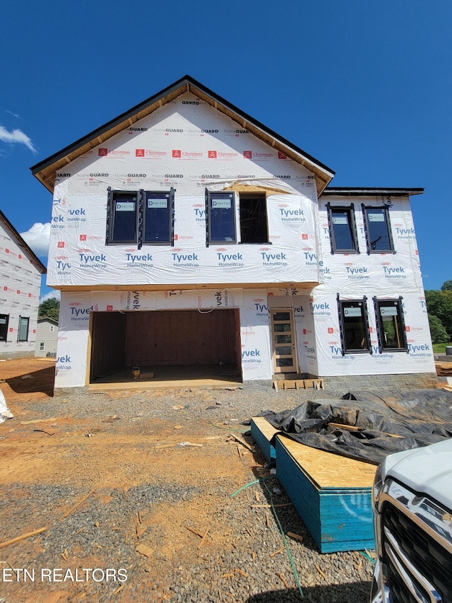 7814 S Northshore Dr, Knoxville, TN 37919 - property in mid-construction featuring an attached garage