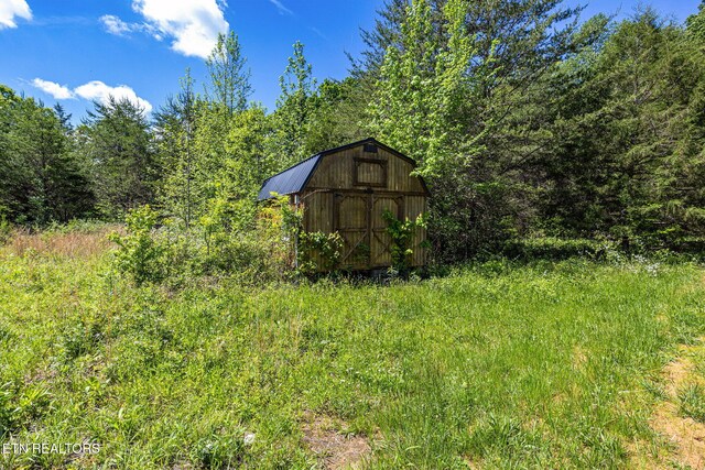 776 Salem Valley Rd, Ten Mile, TN 37880 - view of shed featuring a wooded view