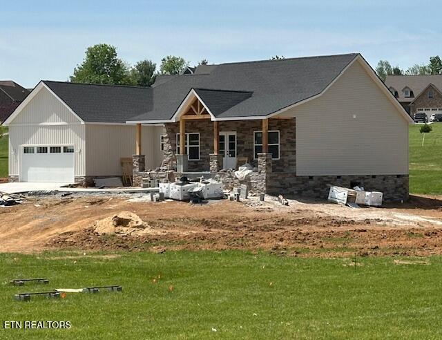 273 Sugar Maple Ct, Madisonville, TN 37354 - view of front facade featuring an attached garage, a front lawn, and driveway