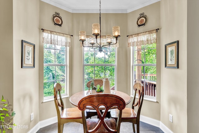 714 Cambridge Crest Ln, Knoxville, TN 37919 - dining room with baseboards, a chandelier, healthy amount of natural light, and crown molding