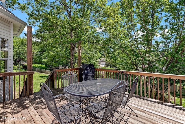 714 Cambridge Crest Ln, Knoxville, TN 37919 - wooden deck featuring outdoor dining space and view of wooded area