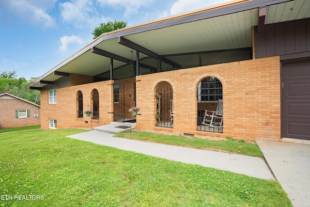 8000 Berkshire Blvd, Powell, TN 37849 - view of front of property with brick siding and a front yard